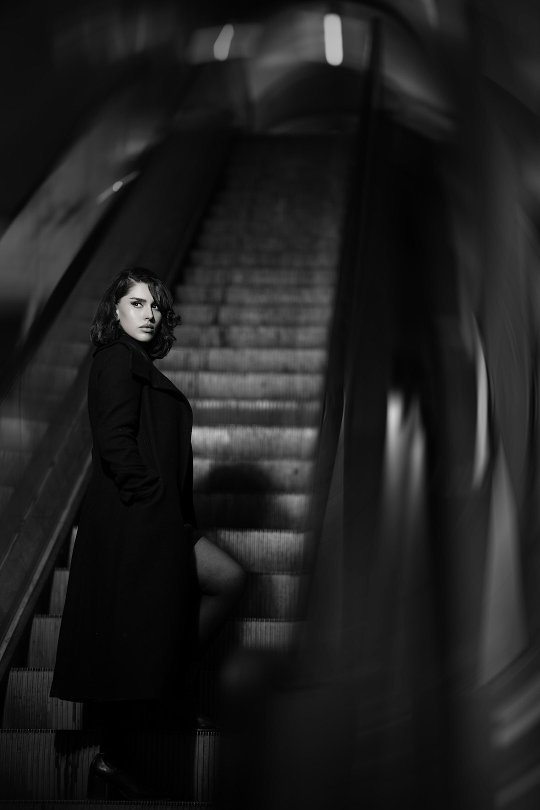 Belgian businesswoman in formal attire smiling at the camera