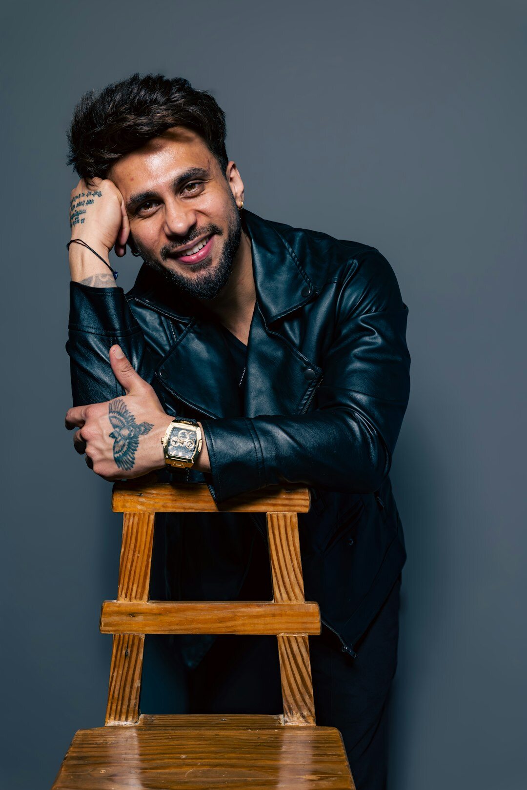 Young European professional man smiling in casual business wear