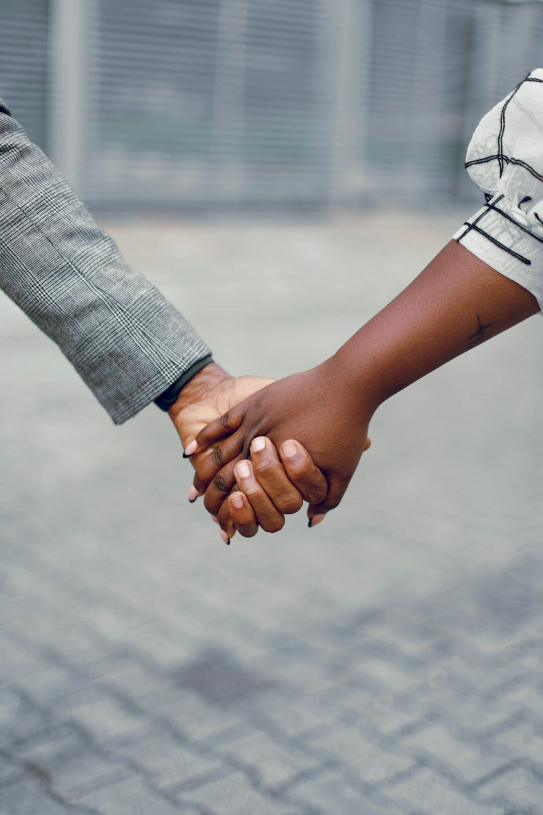 Two business professionals shaking hands after a meeting